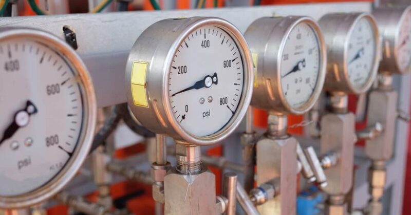 Pressure gauge, measuring instrument close up on pneumatic control system.