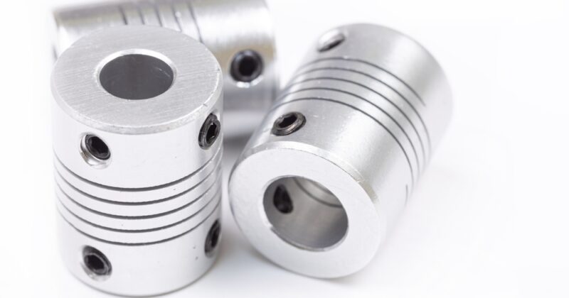 Flexible metal couplings on a white background
