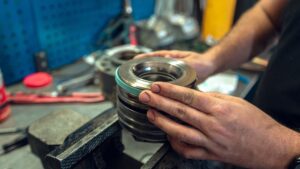 Precision hydraulic pump components arranged for inspection, repair and industrial rebuilding.